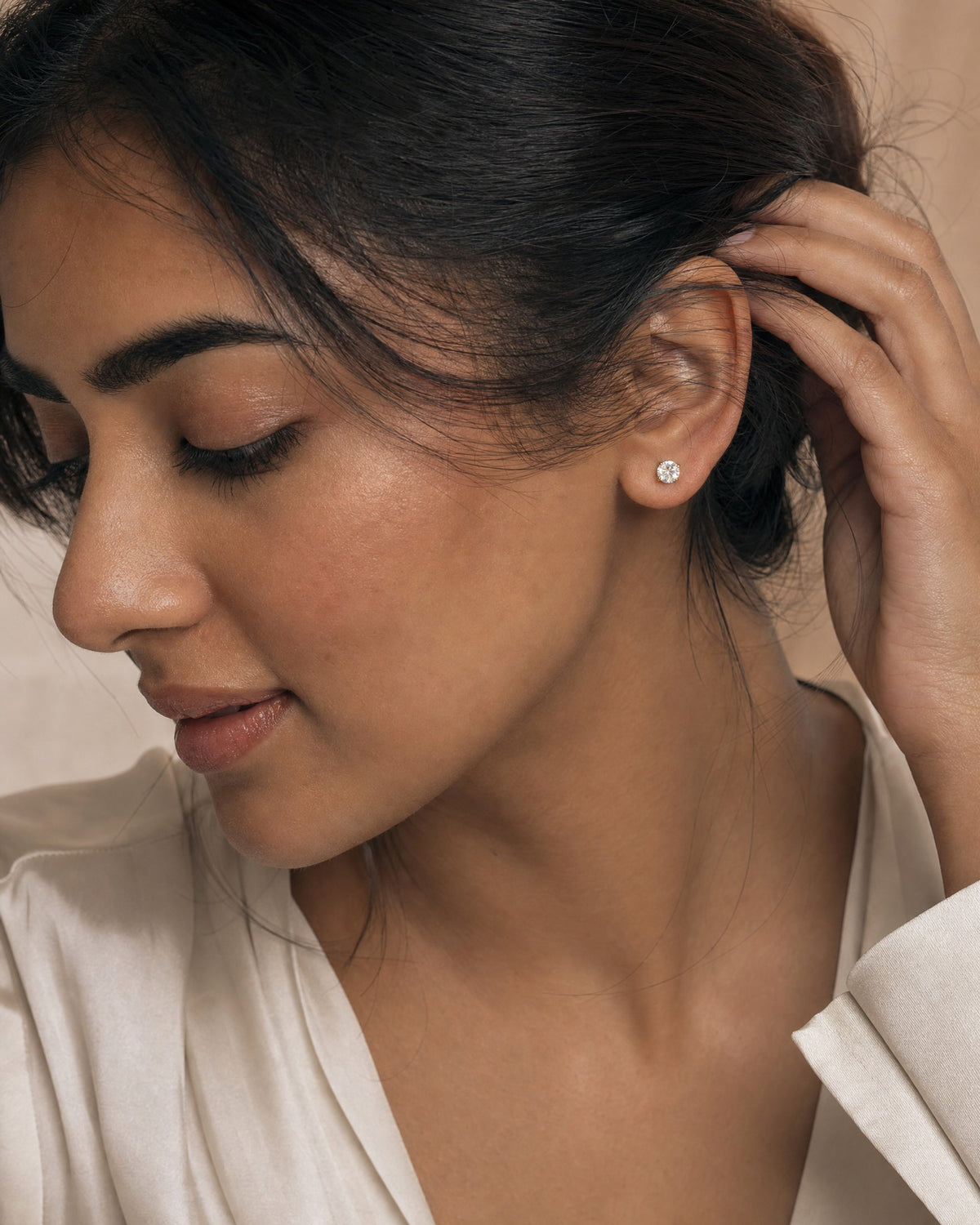 The Lumiere Stud 1 CT, worn